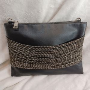 Sondra Robert's ^2 Clutch